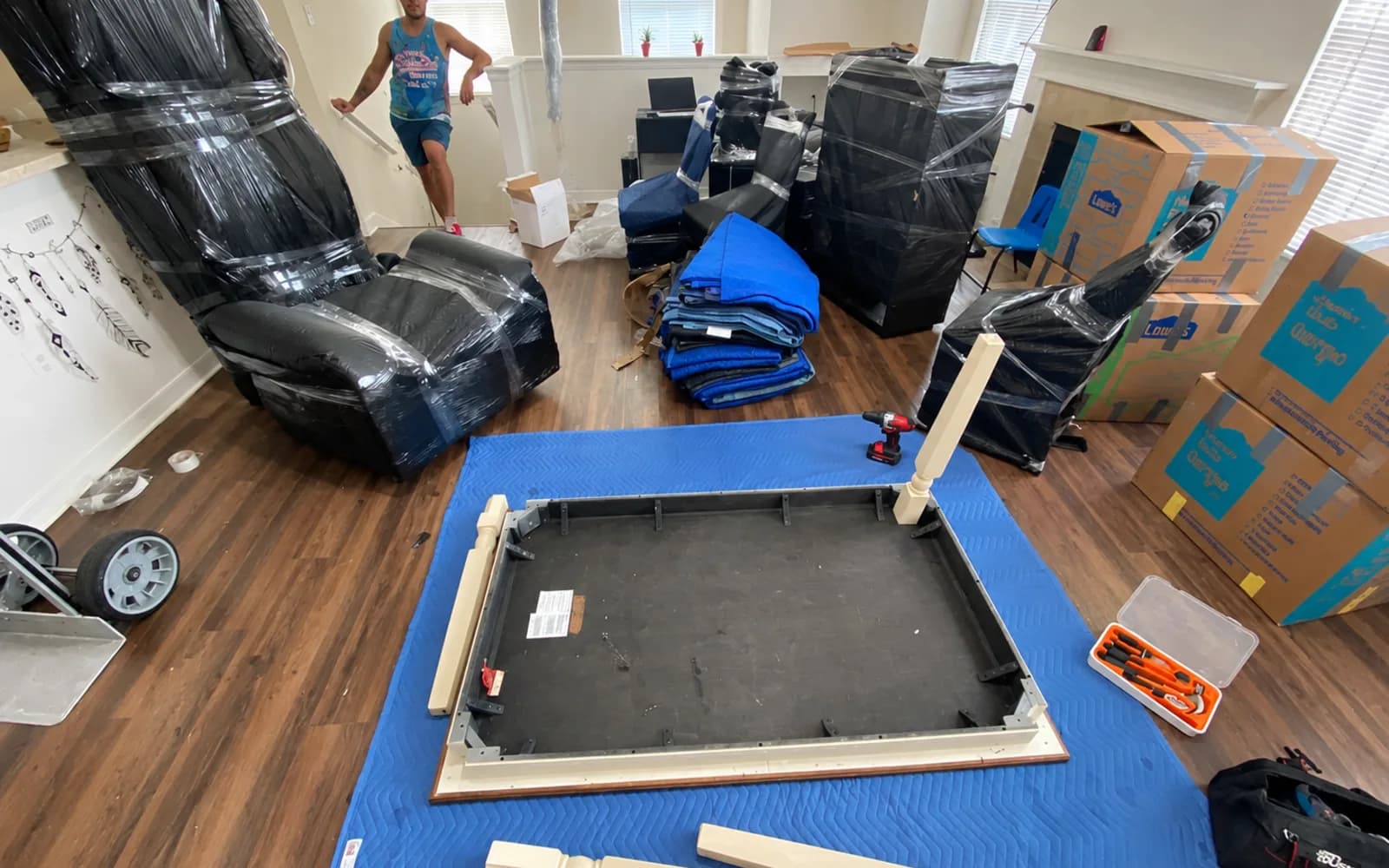 Protected furniture and moving materials arranged inside a home